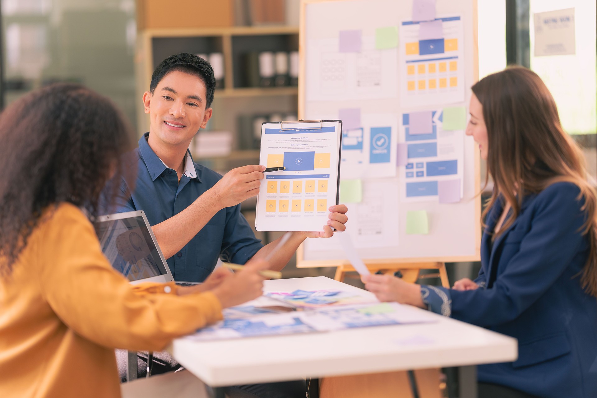 UX/UI design team Discuss and brainstorm layouts for websites and mobile app prototypes in Website and Mobile Application Design Ideas.